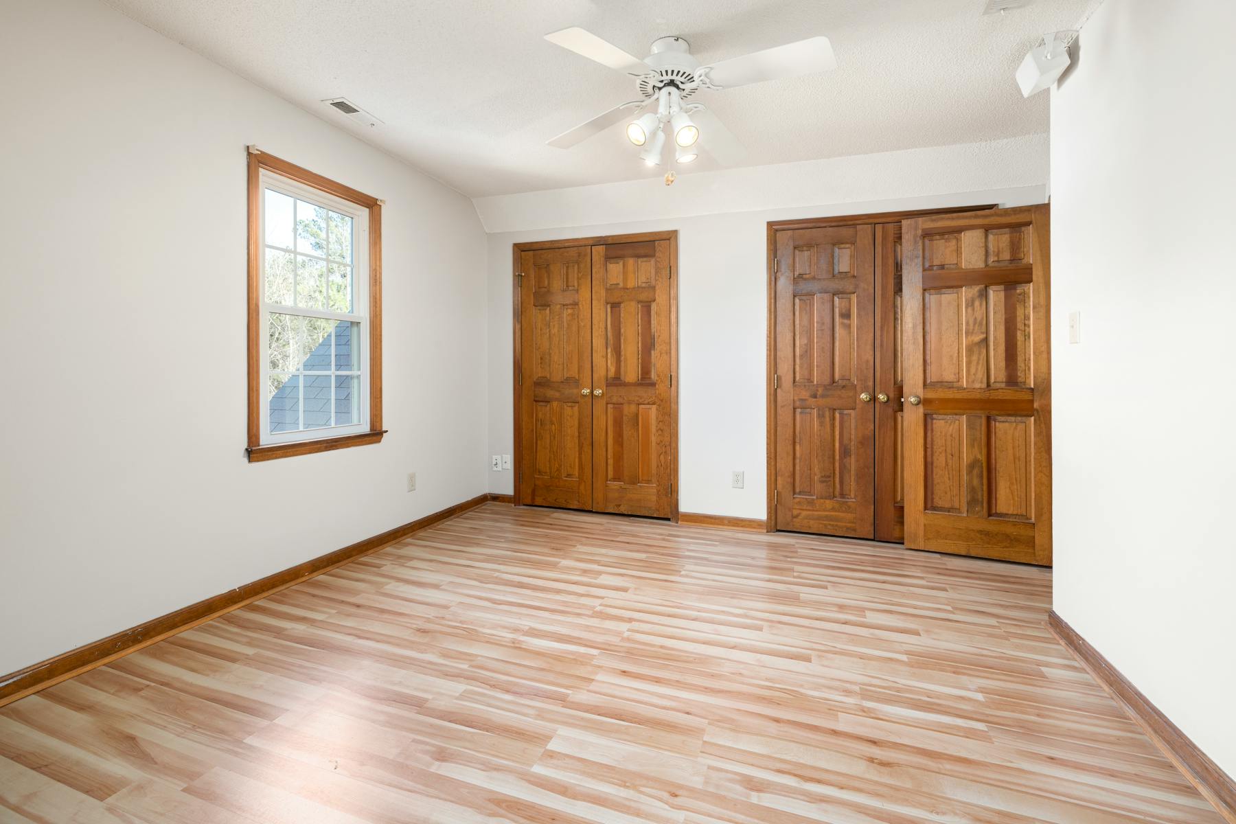 Primary bedroom before staging